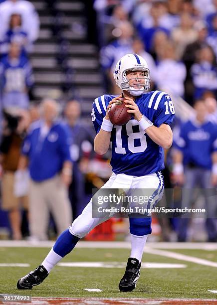 Peyton Manning of the Indianapolis Colts drops back to pass during a game against the New York Jets in the AFC Championship Game at Lucas Oil Stadium...