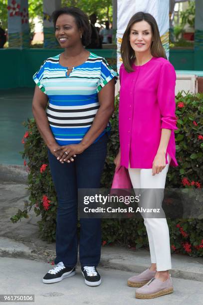 Queen Letizia of Spain and First Lady of Haiti, Martine Moise visit the St. Vincent de Paul Sisters College in the Cite Soleil neighborhood on May...