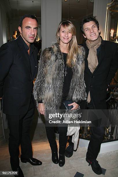 Nikos Aliagas, Sarah Lavoine and Marc Lavoine attend the Balmain flagship launch on January 25, 2010 in Paris, France.