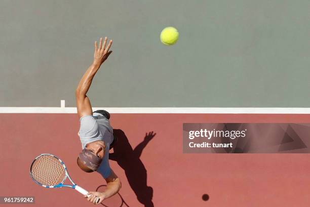 tennis player servering - tennis bildbanksfoton och bilder