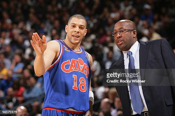 Anthony Parker and head coach Mike Brown of the Cleveland Cavaliers talk during the game against the Golden State Warriors at Oracle Arena on January...