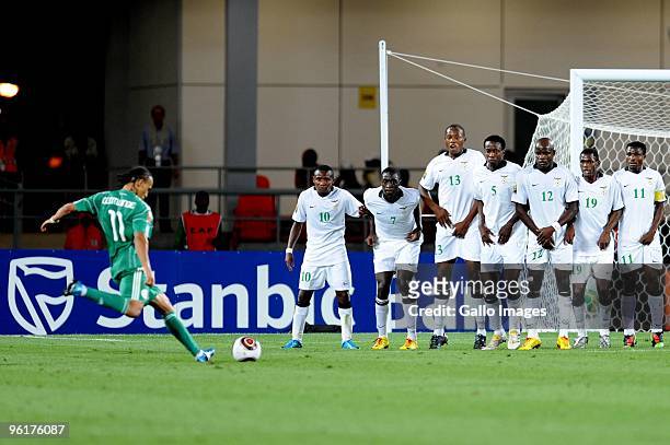 Peter Odemwingie of Nigeria kicks a free kick while Zambian players try to save it during the Africa Cup of Nations Quarter Final match between...