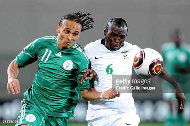 Peter Odemwingie of Nigeria and Emmanuel Mbola of Zambia during the Africa Cup of Nations Quarter Final match between Zambia and Nigeria from the...