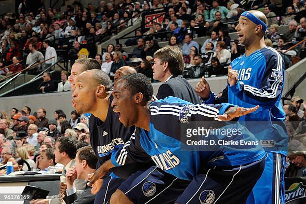 Jose Barea, Shawn Marion, Rodrique Beaubois and Drew Gooden of the Dallas Mavericks celebrate after a play from the bench during the game against the...