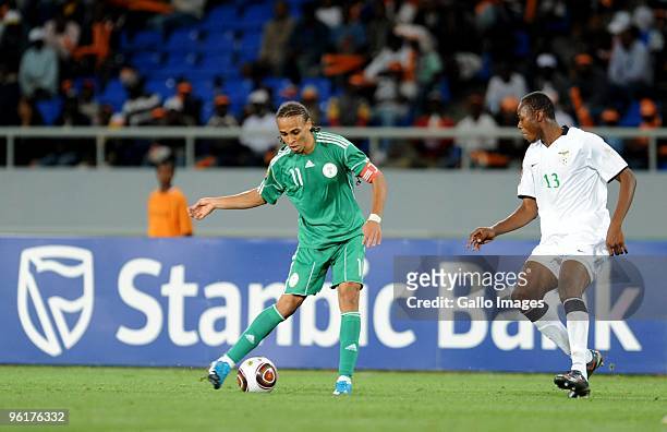 Peter Odemwingie of Nigeria and Stophira Sunzu of Zambia during the Africa Cup of Nations Quarter Final match between Zambia and Nigeria from the...
