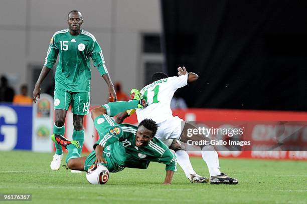 John Obi Mikel of Nigeria and Chris Katongo of Zambia during the Africa Cup of Nations Quarter Final match between Zambia and Nigeria from the Alto...