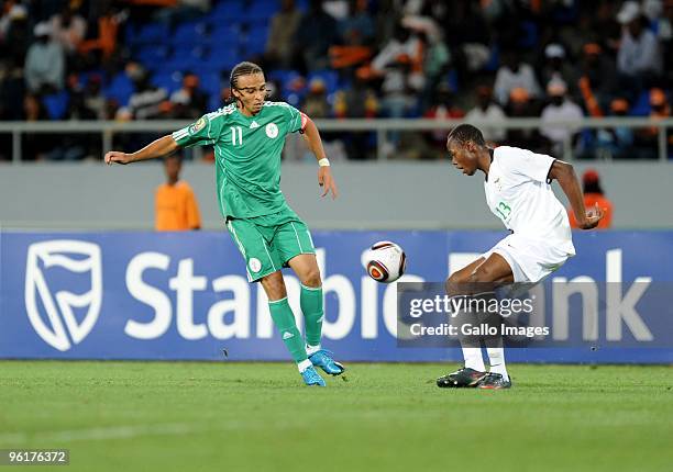 Peter Odemwingie of Nigeria and Stophira Sunzu of Zambia during the Africa Cup of Nations Quarter Final match between Zambia and Nigeria from the...