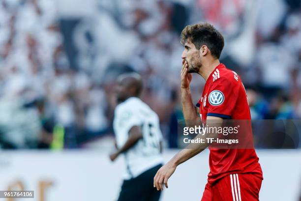 Javi Martinez of Muenchen looks on during the DFB Cup final between Bayern Muenchen and Eintracht Frankfurt at Olympiastadion on May 19, 2018 in...