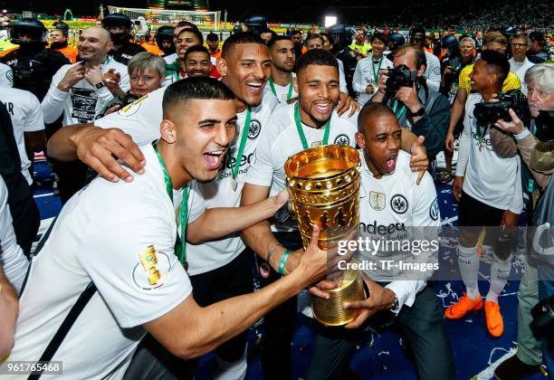 Players of Eintracht Frankfurt celebrate with the trophy after winning the DFB Cup final between Bayern Muenchen and Eintracht Frankfurt at...