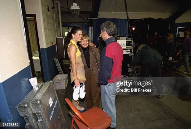 Christmas On Ice: Nancy Kerrigan with her mother Brenda Kerrigan and agent Jerry Solomon backstage after exhibition at Cumberland County Civic...