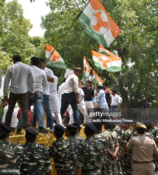 Workers and supporters of Indian Youth Congress protest against hike in petrol and diesel prices at Raisina Road on May 23, 2018 in New Delhi, India.