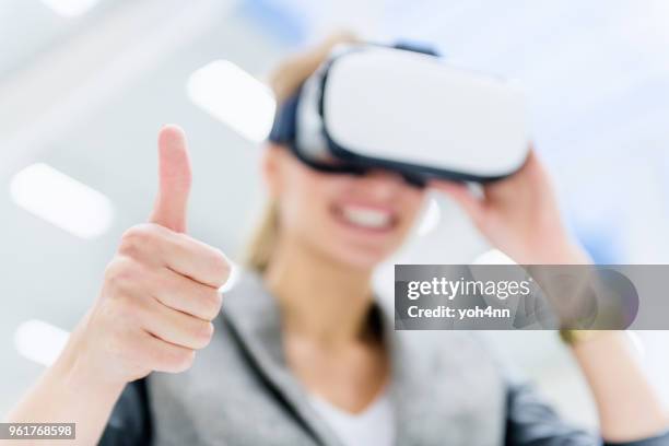 virtual reality innovation & warehouse manager - finger goggles stock pictures, royalty-free photos & images