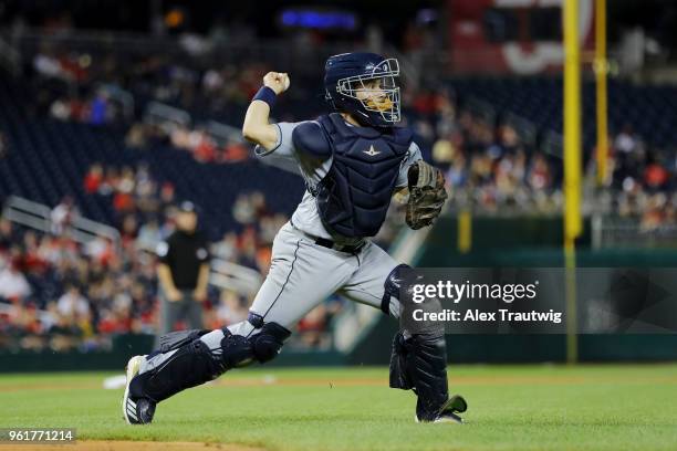 Raffy Lopez of the San Diego Padres throws to first base during a game against the Washington Nationals at Nationals Park on Tuesday, May 22, 2018 in...