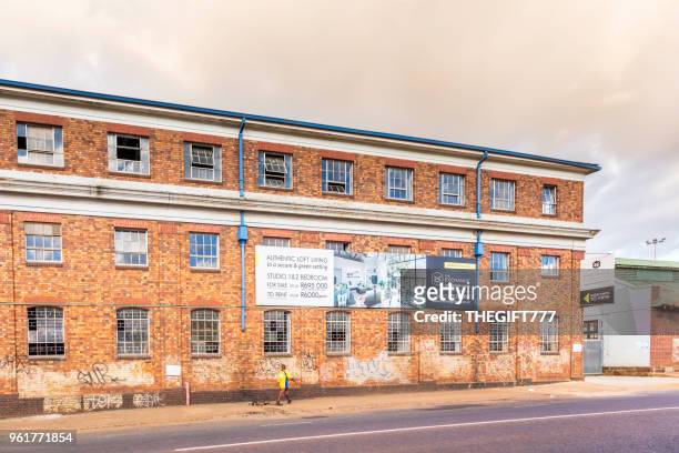 industrial building renovation into residences in johannesburg - housing development south africa stock pictures, royalty-free photos & images