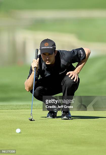 Mike Weir of Canada lines up a putt on the seventh hole during the final round of the Bob Hope Classic at the Palmer Private Course at PGA West on...