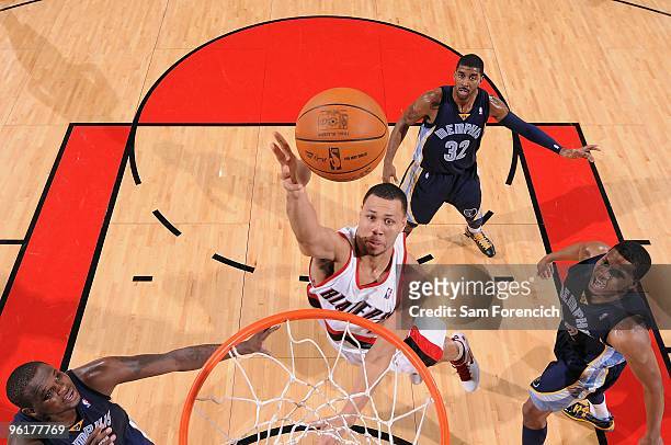 Brandon Roy of the Portland Trail Blazers puts up a shot between Zach Randolph and Rudy Gay of the Memphis Grizzlies during the game on January 5,...