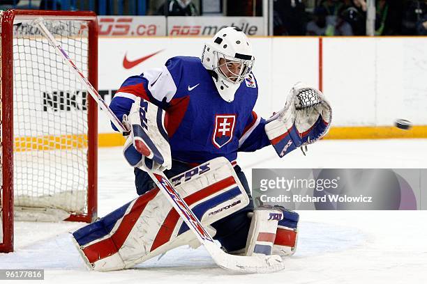 Marek Ciliak of Team Slovakia gets down to make a glove save on the puck during the 2010 IIHF World Junior Championship Tournament Relegation game...