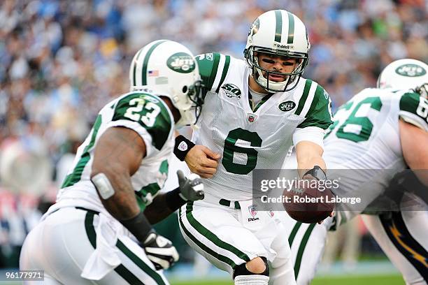 Quarterback Mark Sanchez of the New York Jets looks to hand the ball off to Shonn Greene against the San Diego Chargers during the AFC Divisional...