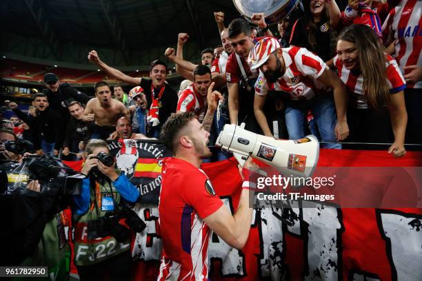 Saul Niguez of Atletico Madrid celebrates with fans after winning the UEFA Europa League Final between Olympique de Marseille and Club Atletico de...