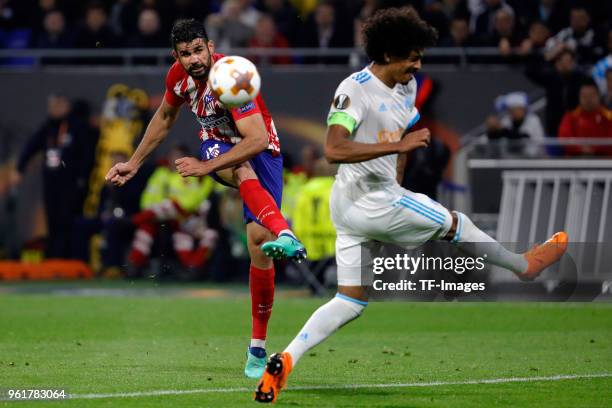 Diego Costa of Atletico Madrid kicks the ball past Luiz Gustavo of Marseille during the UEFA Europa League Final between Olympique de Marseille and...