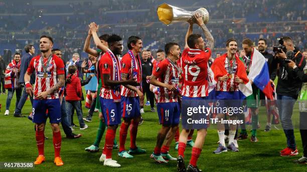 The team of Atletico Madrid celebrate with the Trophy after winning the UEFA Europa League Final between Olympique de Marseille and Club Atletico de...