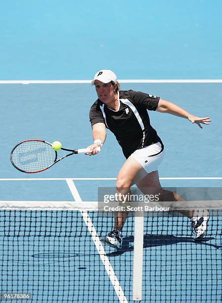 Lisa Raymond of the USA plays a forehand in her fourth round doubles match with Rennae Stubbs of Australia against Gisela Dulko of Argentina and...