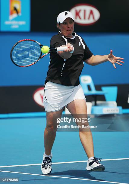 Lisa Raymond of the USA plays a forehand in her fourth round doubles match with Rennae Stubbs of Australia against Gisela Dulko of Argentina and...
