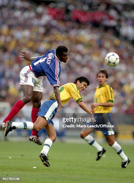 July 1998 FIFA World Cup Final - France v Brazil - French defender Marcel Desailly outjumps Bebeto of Brazil to win the heading duel