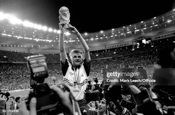 July 1998 FIFA World Cup Final - France v Brazil - French coach Aime Jacquet holds aloft the trophy