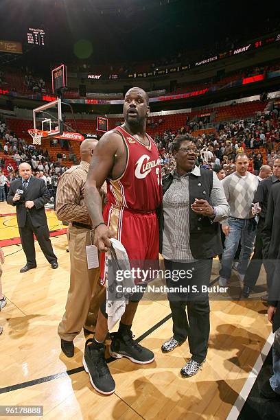 Shaquille O'Neal of the Cleveland Cavaliers, and his mother Lucille Harrison, celebrate a narrow victory against the Miami Heat during a game on...