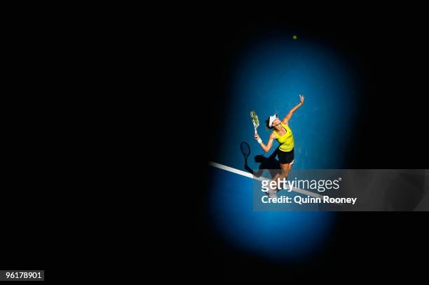 Maria Kirilenko of Russia serves in her quarterfinal match against Jie Zheng of China during day nine of the 2010 Australian Open at Melbourne Park...