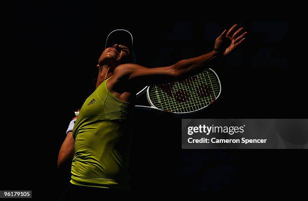 Maria Kirilenko of Russia serves in her quarterfinal match against Jie Zheng of China during day nine of the 2010 Australian Open at Melbourne Park...
