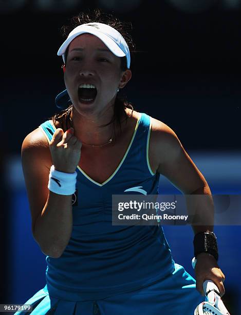 Jie Zheng of China celebrates winning a point in her quarterfinal match against Maria Kirilenko of Russia during day nine of the 2010 Australian Open...