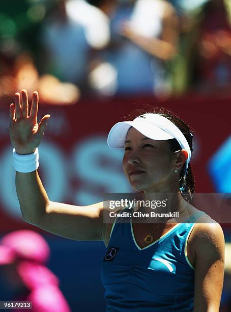 Jie Zheng of China thanks the crowd after winning her quarterfinal match against Maria Kirilenko of Russia during day nine of the 2010 Australian...