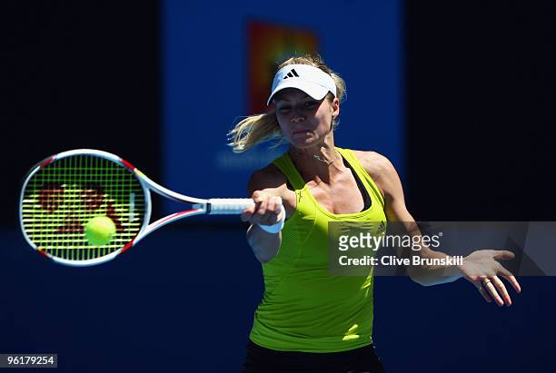 Maria Kirilenko of Russia plays a forehand in her quarterfinal match against Jie Zheng of China during day nine of the 2010 Australian Open at...