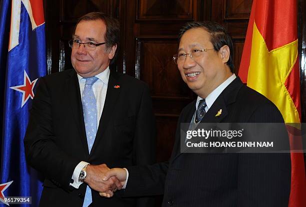 New Zealand's Foreign Minister Murray McCully shakes hands with his Vietnamese counterpart Pham Gia Khiem as they meet in Hanoi on January 26, 2010....