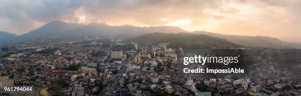 aerial panorama view of beppu cityscape from drone at sunset - impossiable fotografías e imágenes de stock