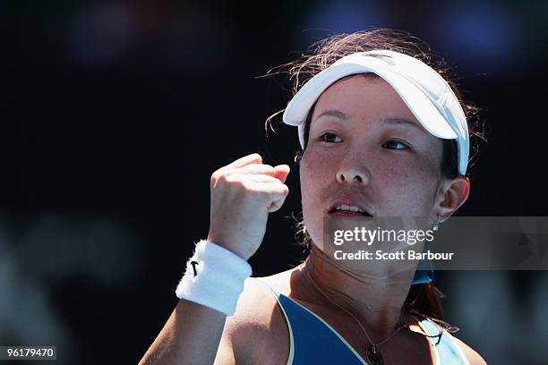 Jie Zheng of China celebrates winning a point in her quarterfinal match against Maria Kirilenko of Russia during day nine of the 2010 Australian Open...