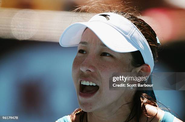 Jie Zheng of China celebrates winning a point in her quarterfinal match against Maria Kirilenko of Russia during day nine of the 2010 Australian Open...