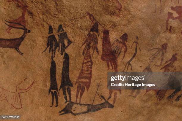 The dancers of Cogul. Cave painting from the Roca de los Moros . Found in the Collection of Museu d'Arqueologia de Catalunya, Barcelona.