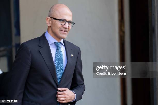 Satya Nadella, chief executive officer of Microsoft Corp., departs the 'Tech For Good' meeting at Elysee Palace in Paris, France, on Wednesday, May...