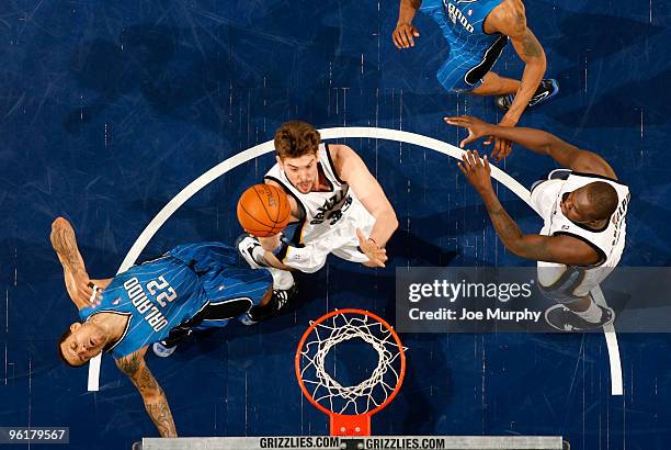 Marc Gasol of the Memphis Grizzlies shoots over Matt Barnes of the Orlando Magic on January 25, 2010 at FedExForum in Memphis, Tennessee. NOTE TO...