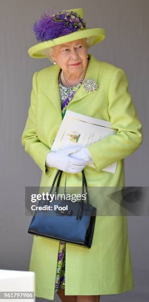 Queen Elizabeth II attends the wedding of Prince Harry to Ms Meghan Markle at St George's Chapel, Windsor Castle on May 19, 2018 in Windsor, England....