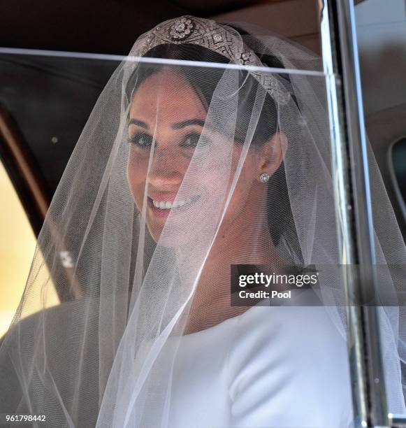 Meghan Markle arrives at St George's Chapel, Windsor Castle for her wedding to Prince Harry on May 19, 2018 in Windsor, England. Prince Henry Charles...