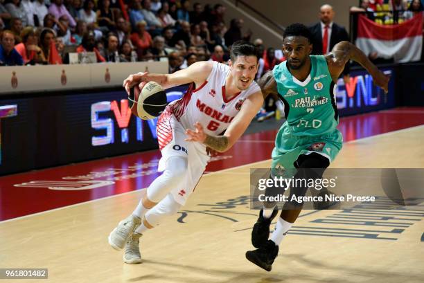 Paul Lacombe of Monaco and Taqwa Pinero of Pau Orthez during the Jeep Elite quarter final playoff match between Monaco and Pau Orthez Lacq on May 23,...