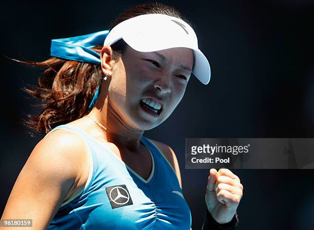 Jie Zheng of China celebrates in her quarterfinal match against Maria Kirilenko of Russia during day nine of the 2010 Australian Open at Melbourne...
