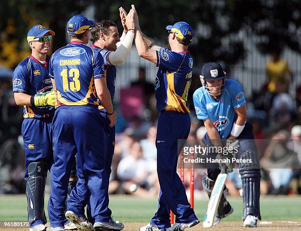 Nathan McCullum of Otago celebrates after bowling Lou Vincent of Auckland during the HRV Cup Twenty20 match between the Auckland Aces and the Otago...