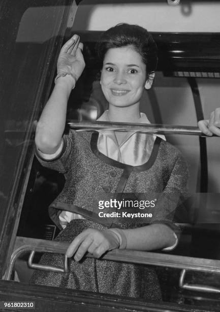 French actress Marie-José Nat films a scene for the movie 'La Française et l'Amour' ('Love and the Frenchwoman' at the Gare de Lyon in Paris, France,...