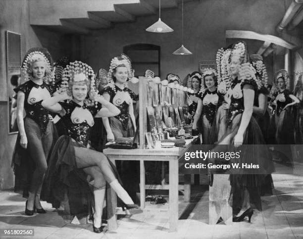 English actress Anna Neagle stars as a chorus girl in the film 'Limelight', aka 'Street Singer's Serenade' or 'Backstage', during filming at the...