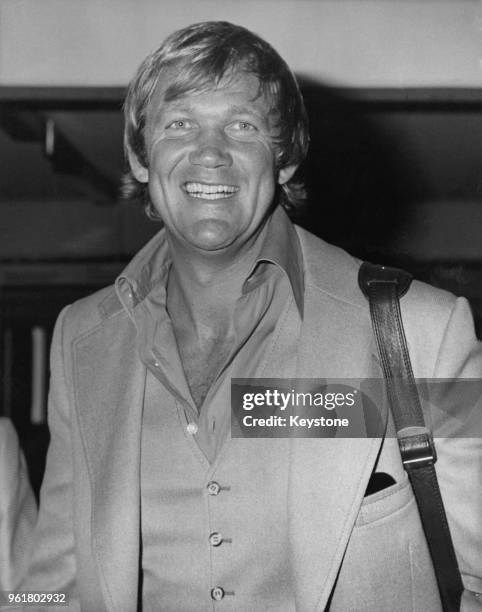 Swedish-American actor Bo Svenson arrives at Heathrow Airport in London from the United States, 12th July 1976.